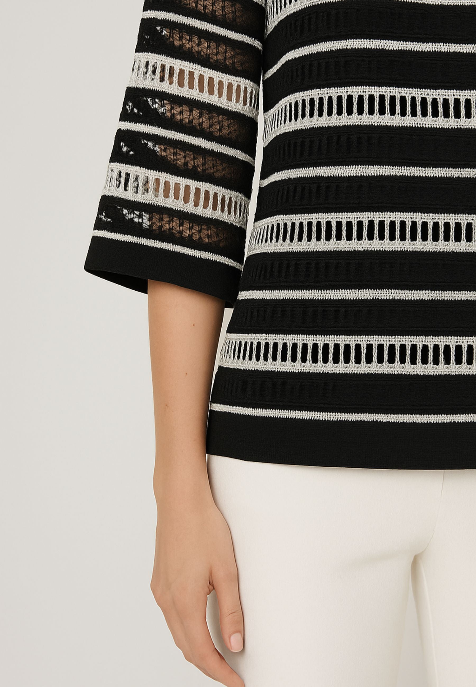 Blusa traforata con top