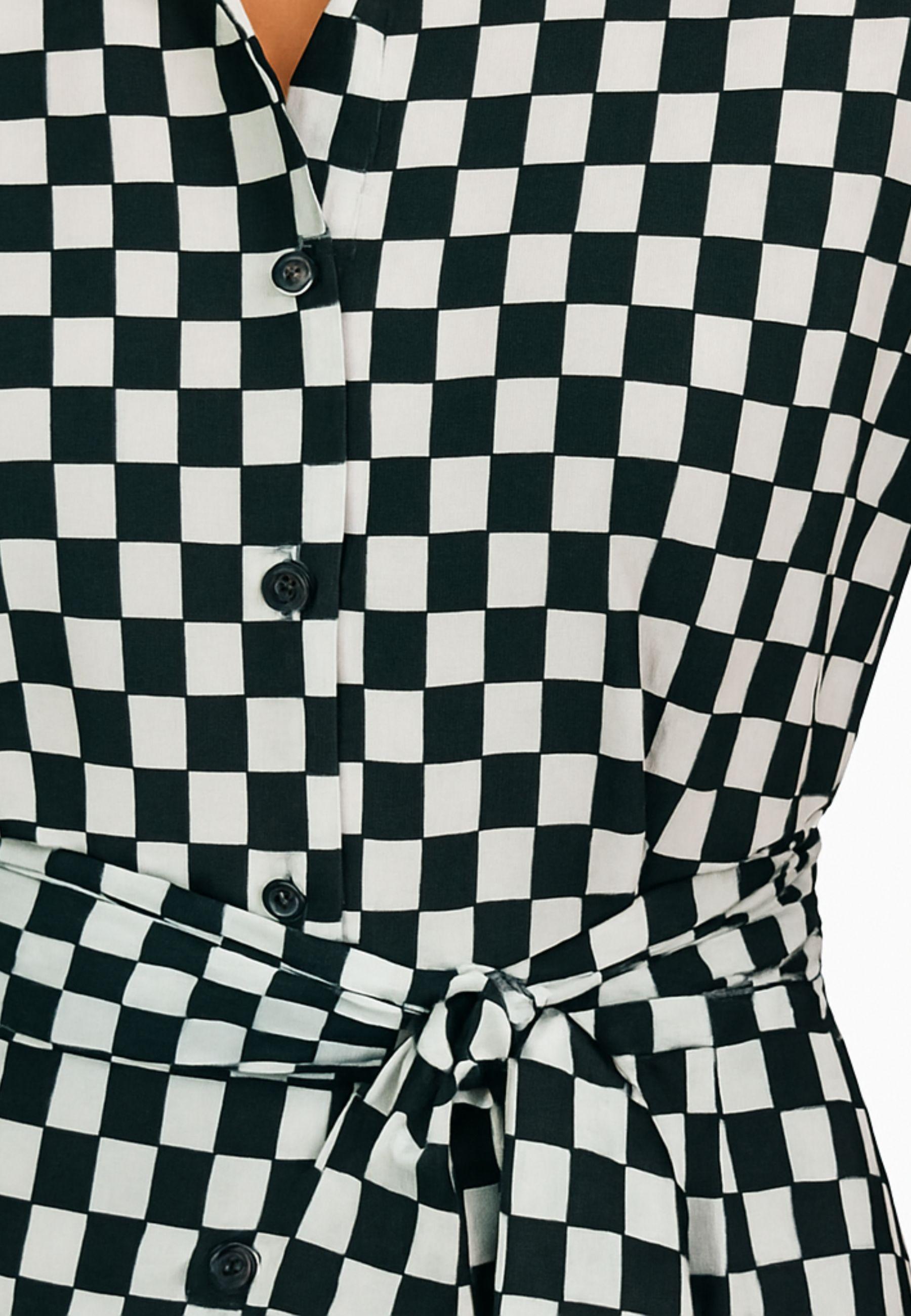 Camicia con nodo in vita