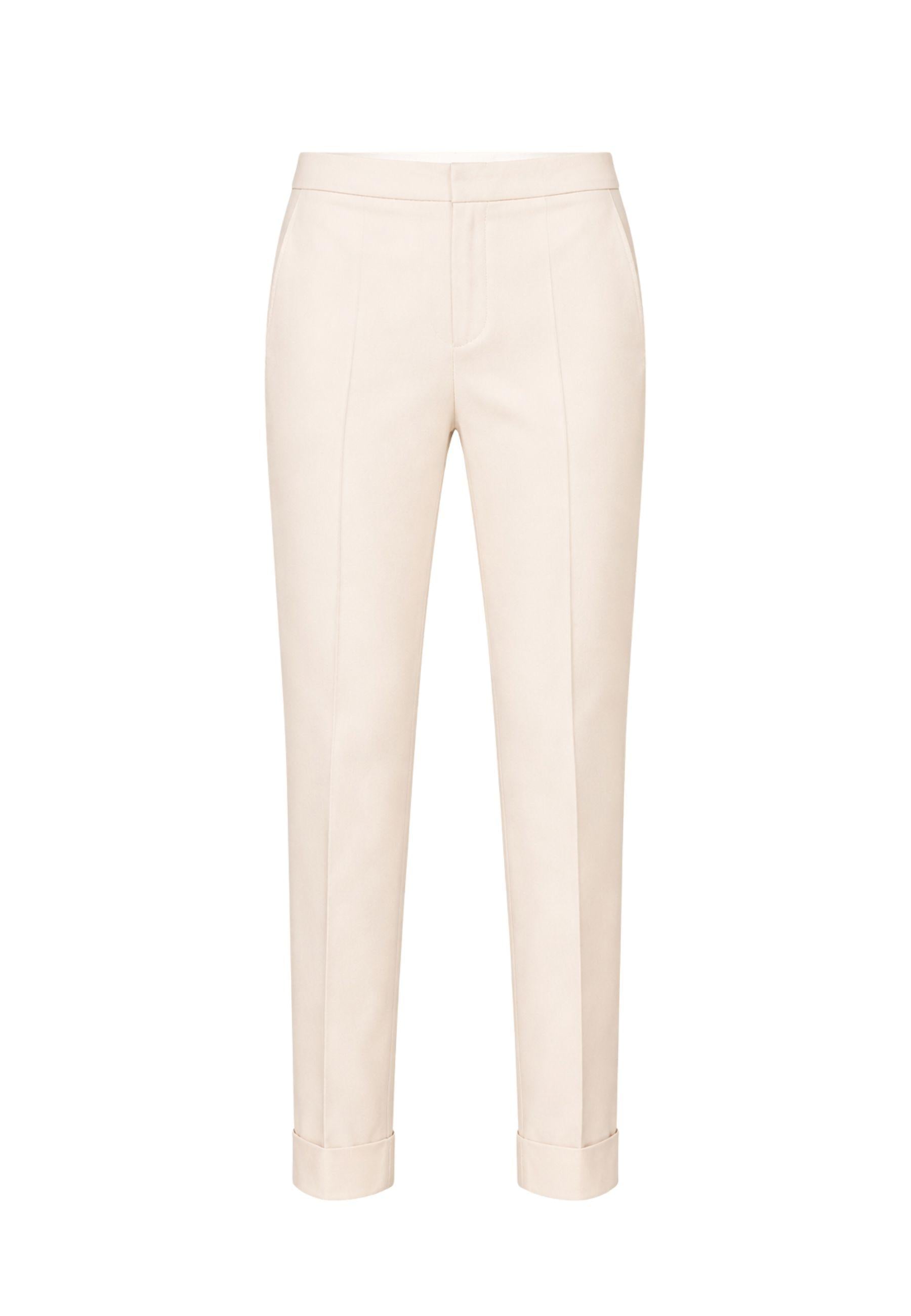 Pantaloni a sigaretta con piega