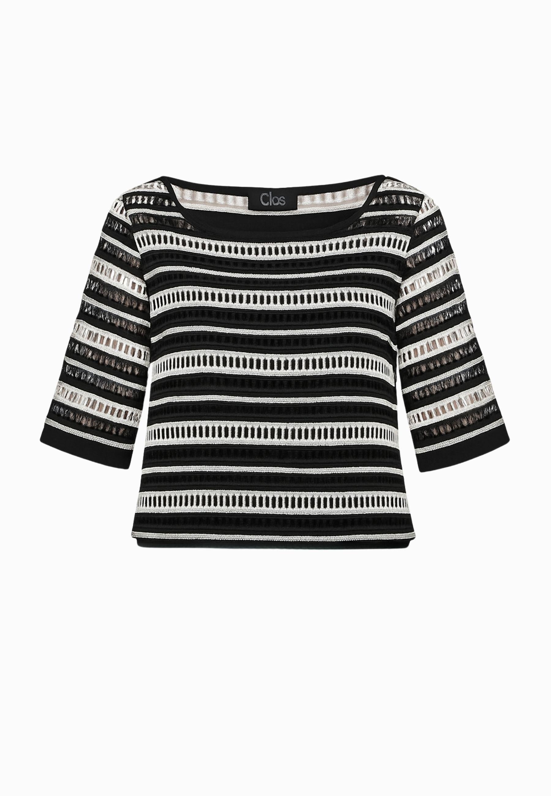Blusa traforata con top