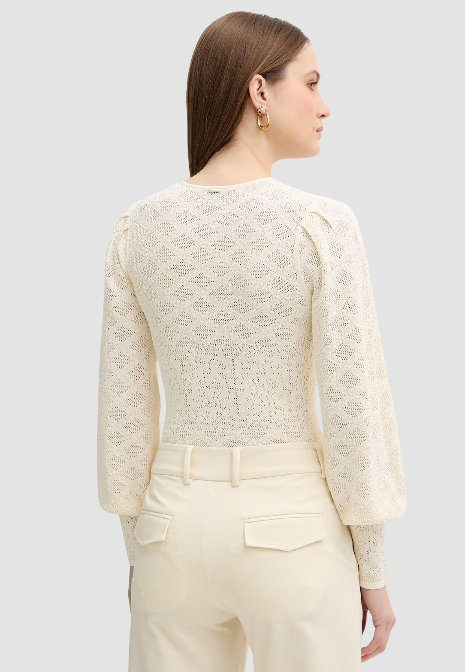 Body in maglia con disegno floreale
