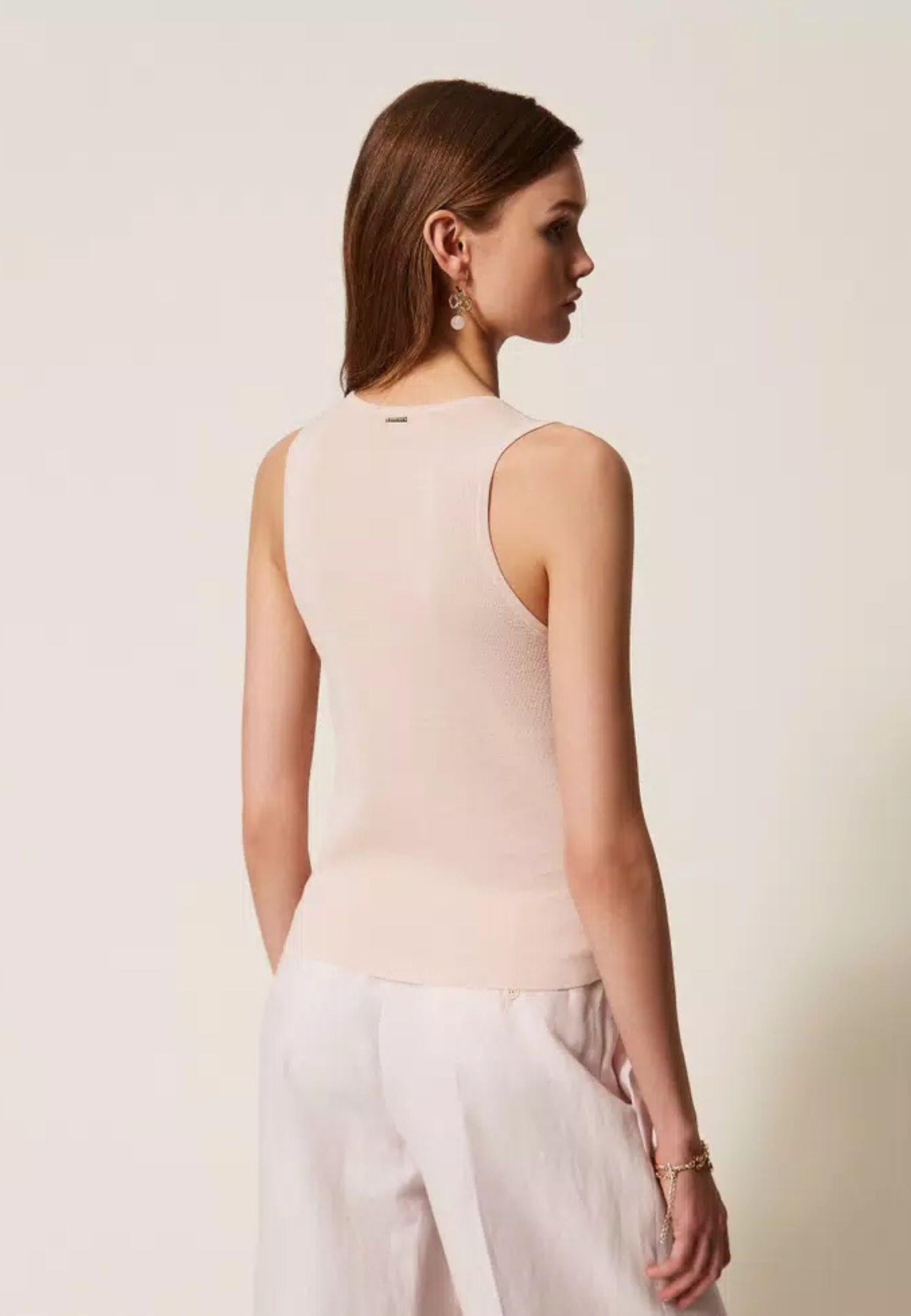 Top in maglia con paillettes