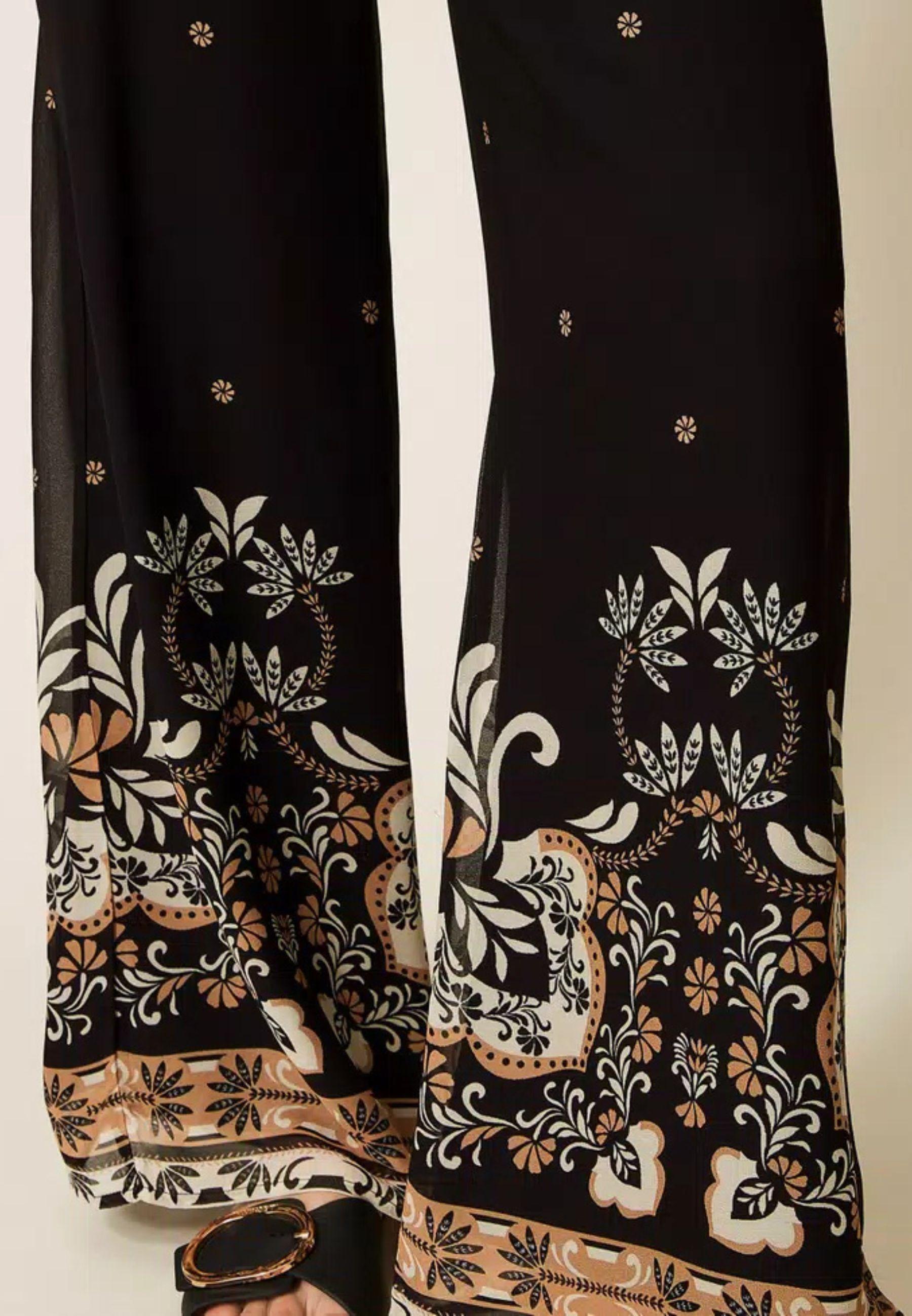 Pantaloni ampi in georgette stampata effetto foulard