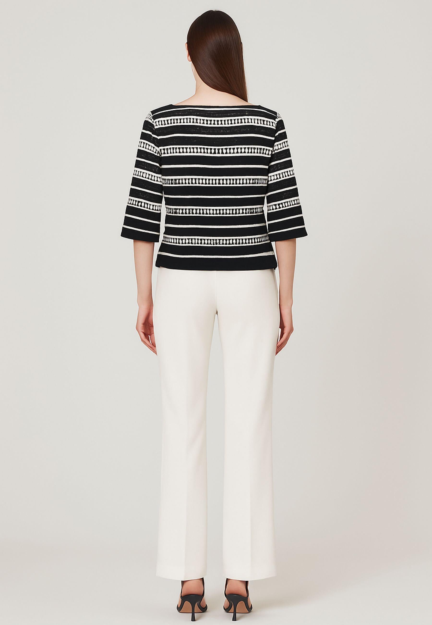 Blusa traforata con top