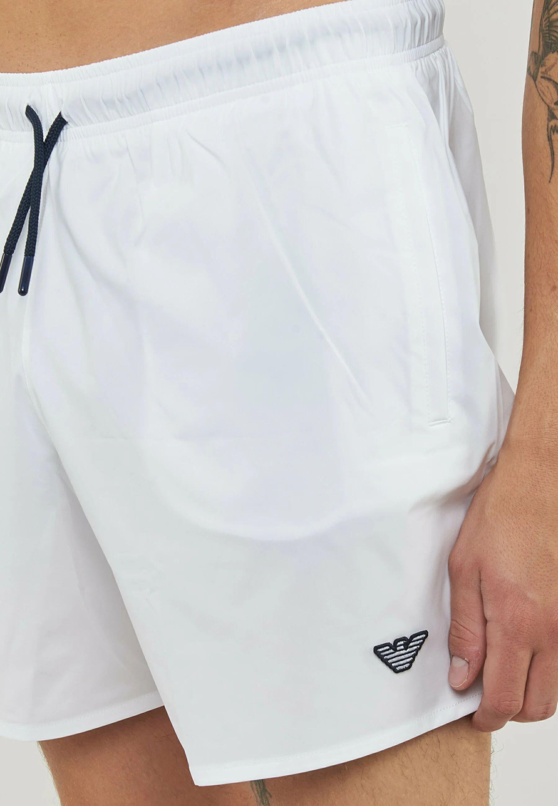 Costume da bagno uomo Emporio Armani - shorts bianchi con aquila ricamata