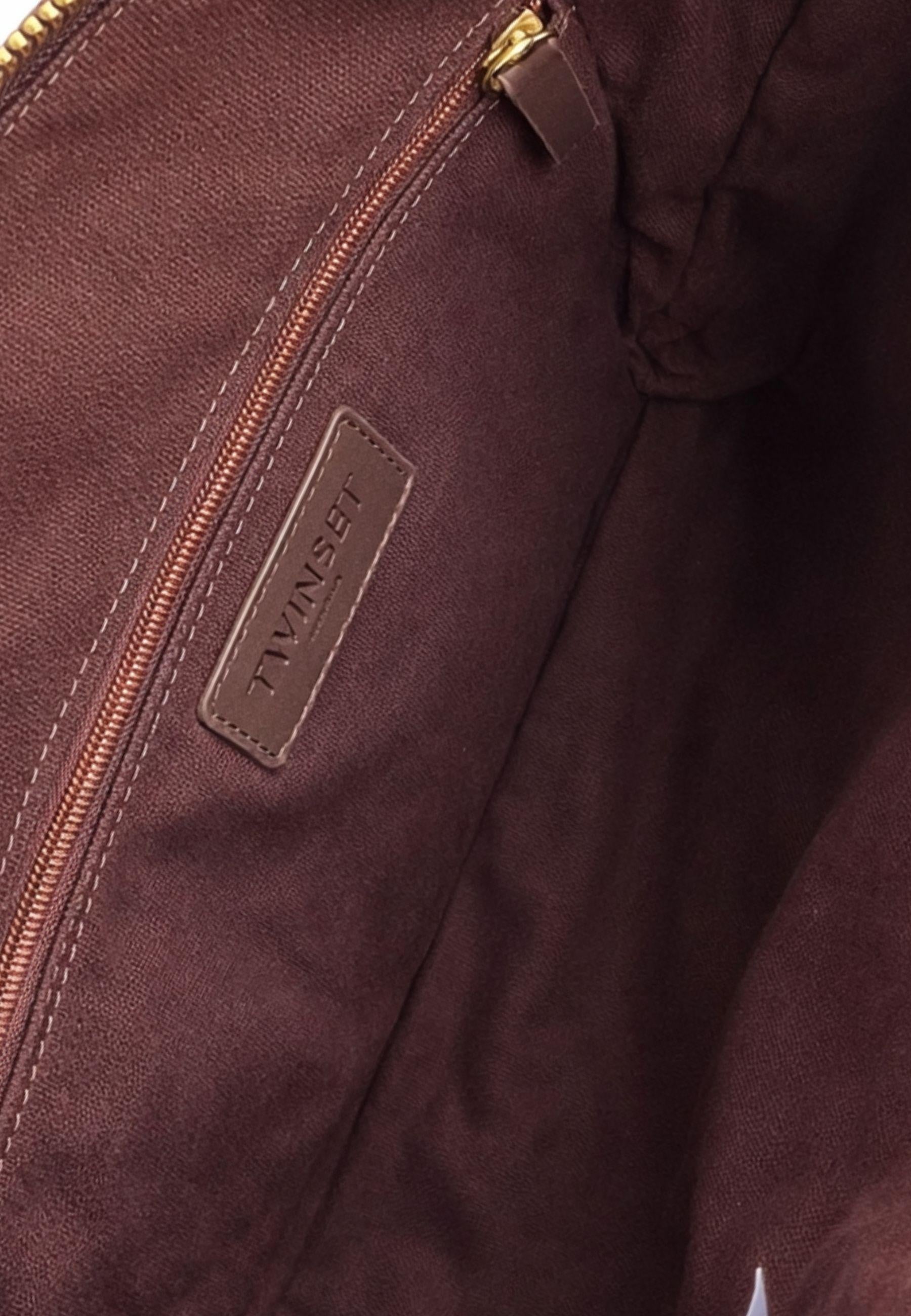 Borsa in macramè con dettagli in pelle