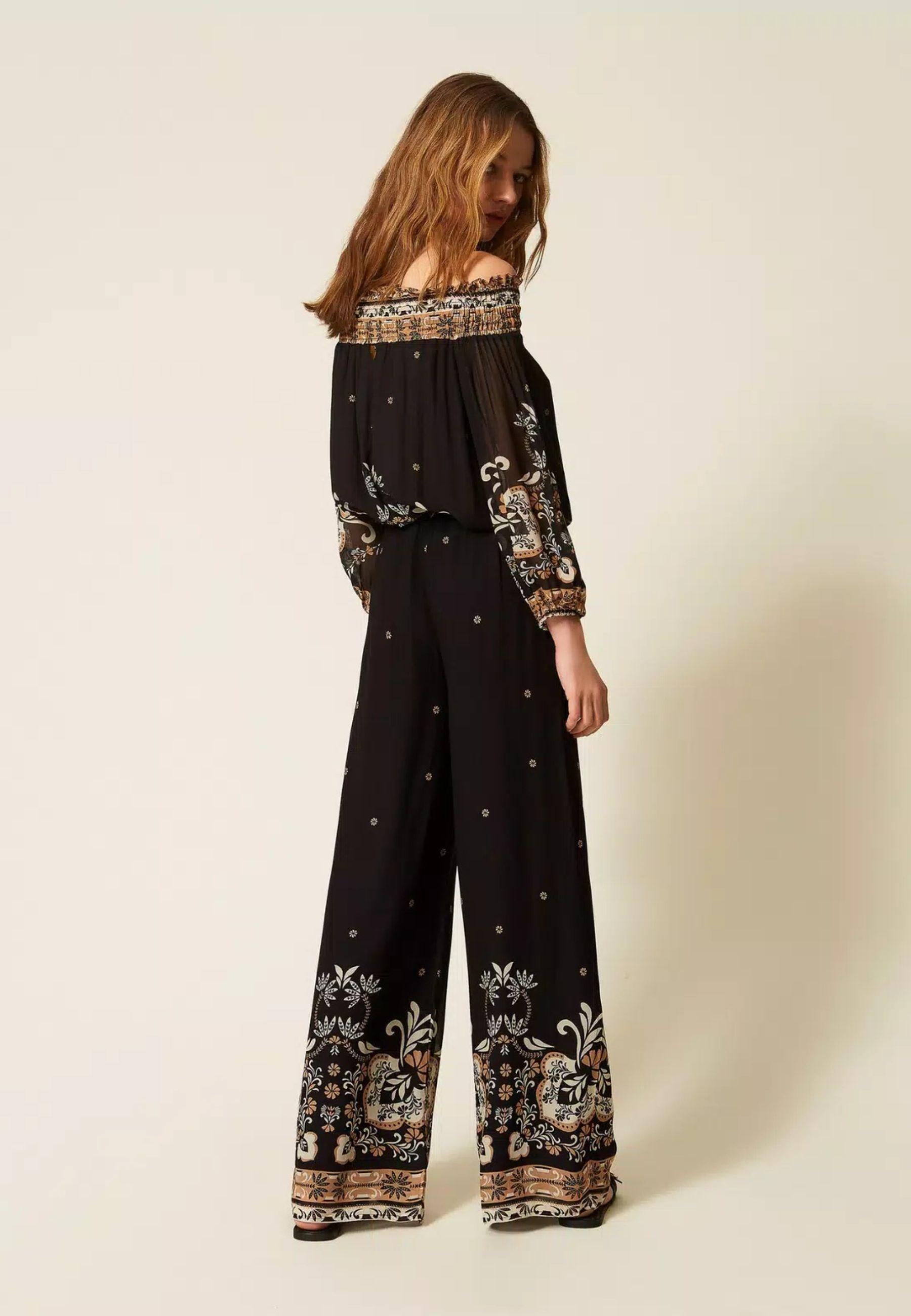 Pantaloni ampi in georgette stampata effetto foulard