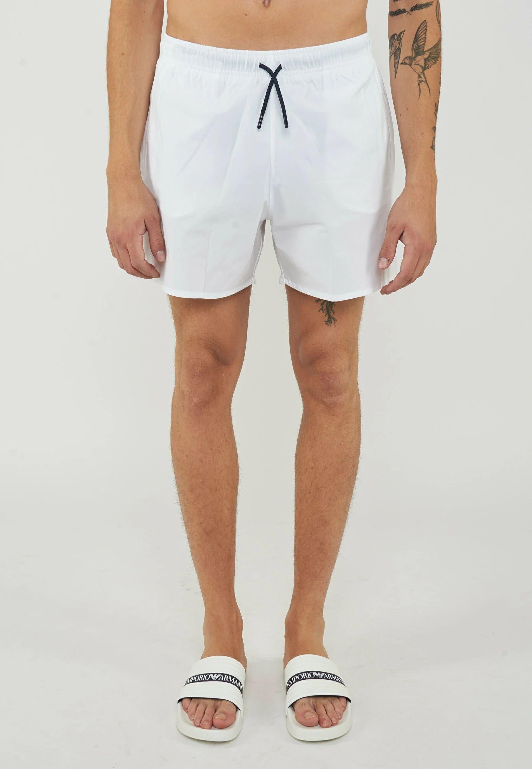 Costume da bagno uomo Emporio Armani - shorts bianchi con aquila ricamata