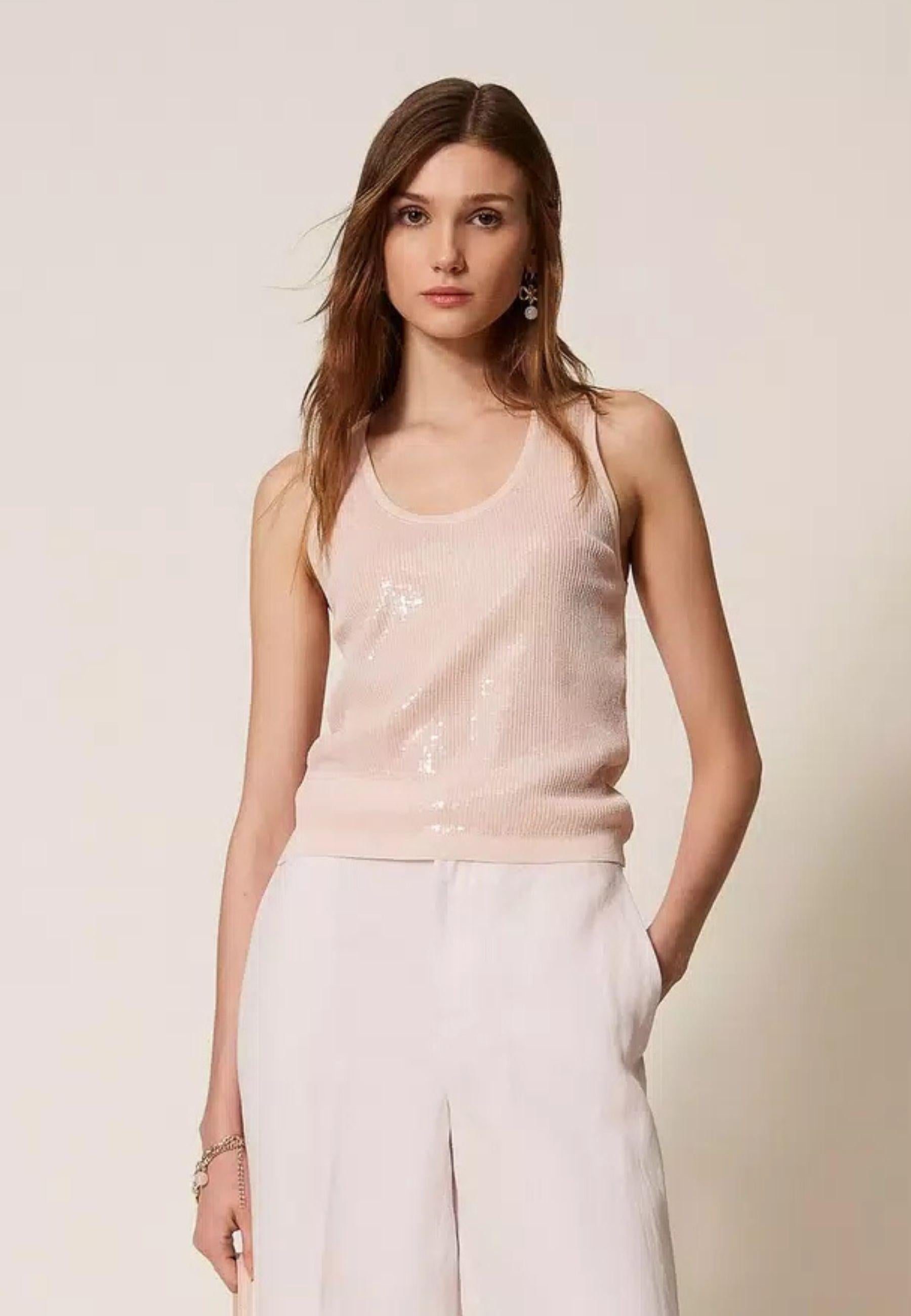 Top in maglia con paillettes