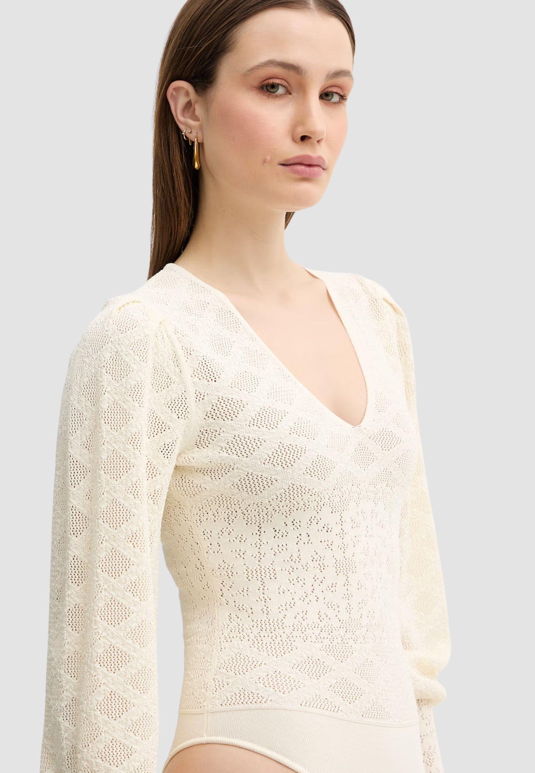Body in maglia con disegno floreale