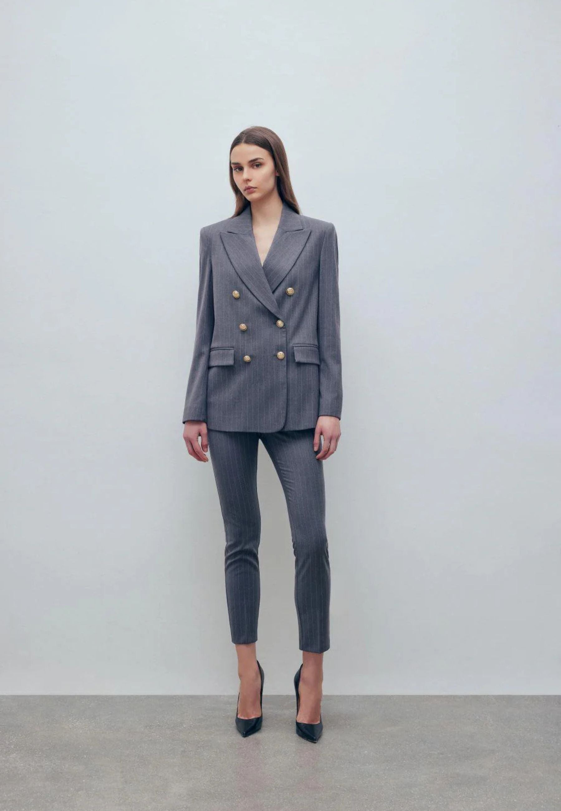 Monique Garçonne - Pantaloni slim in poliviscosa gessata 