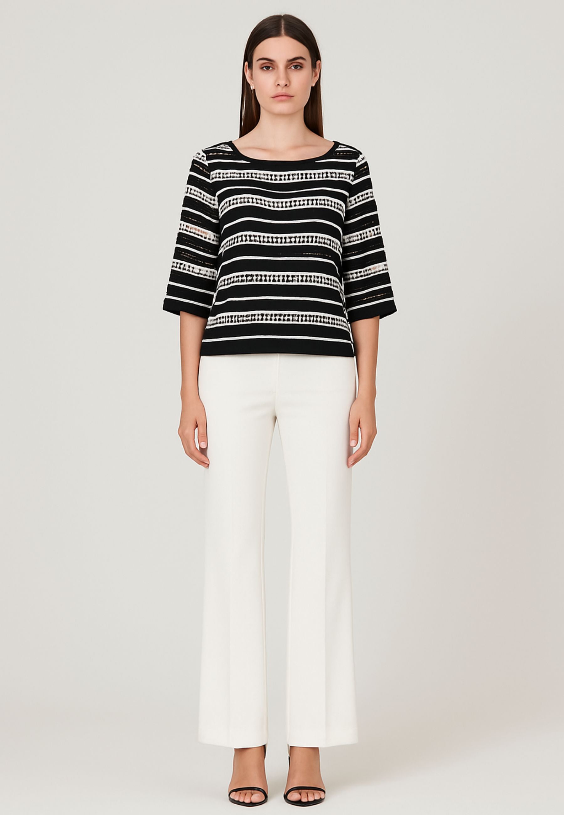 Blusa traforata con top 