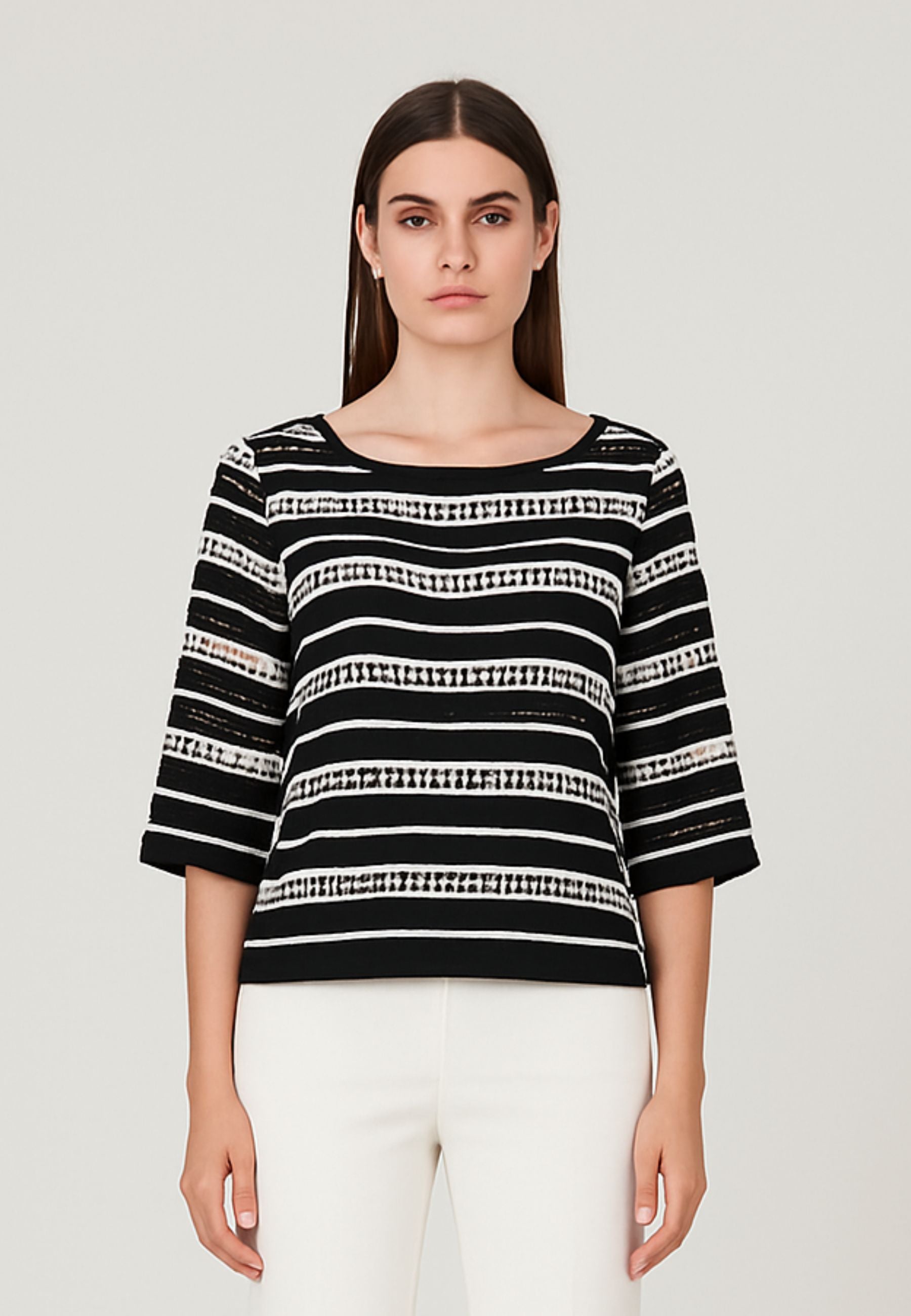 Blusa traforata con top 