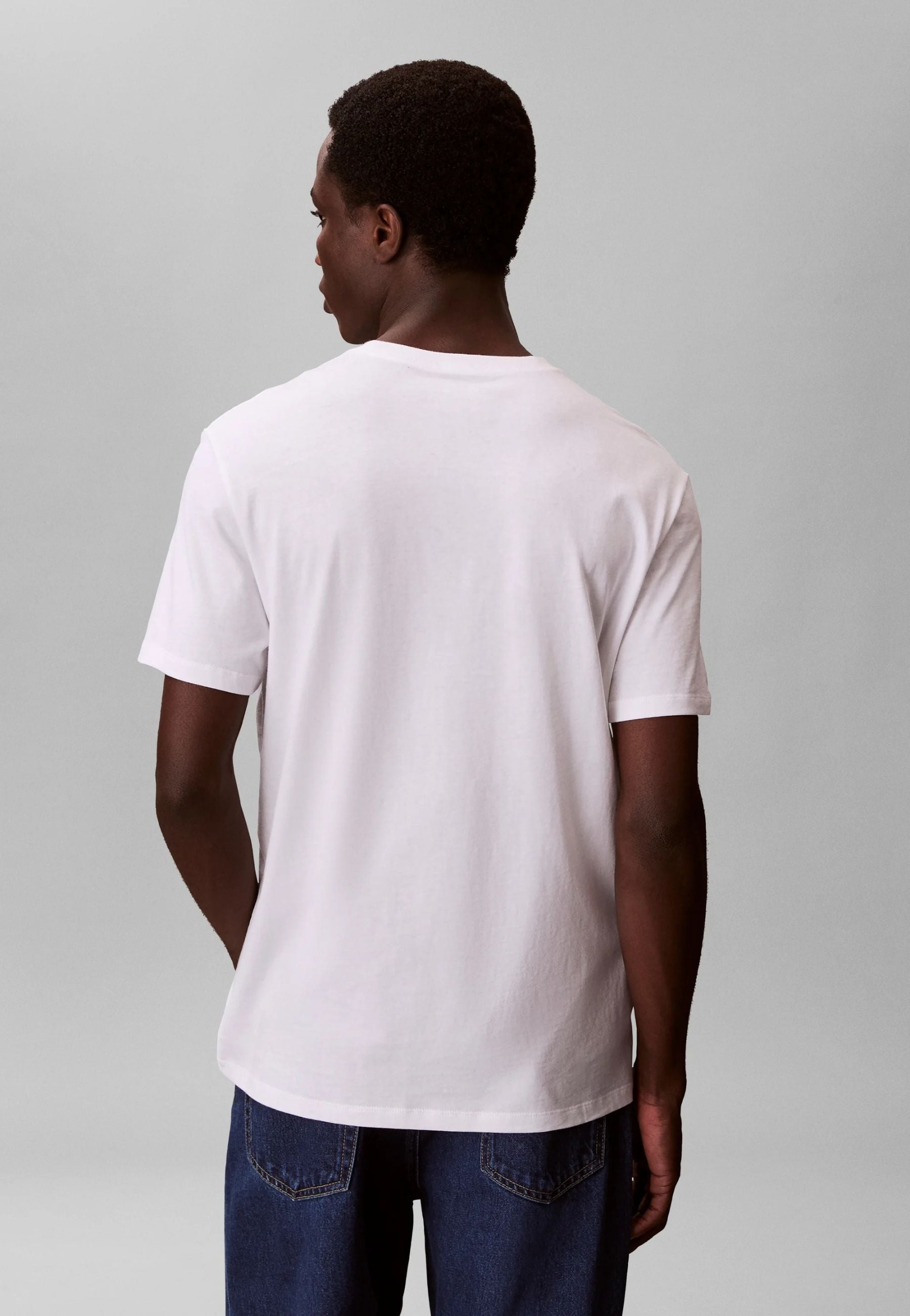 Calvin Klein - T-shirt logo CK in jersey di cotone 