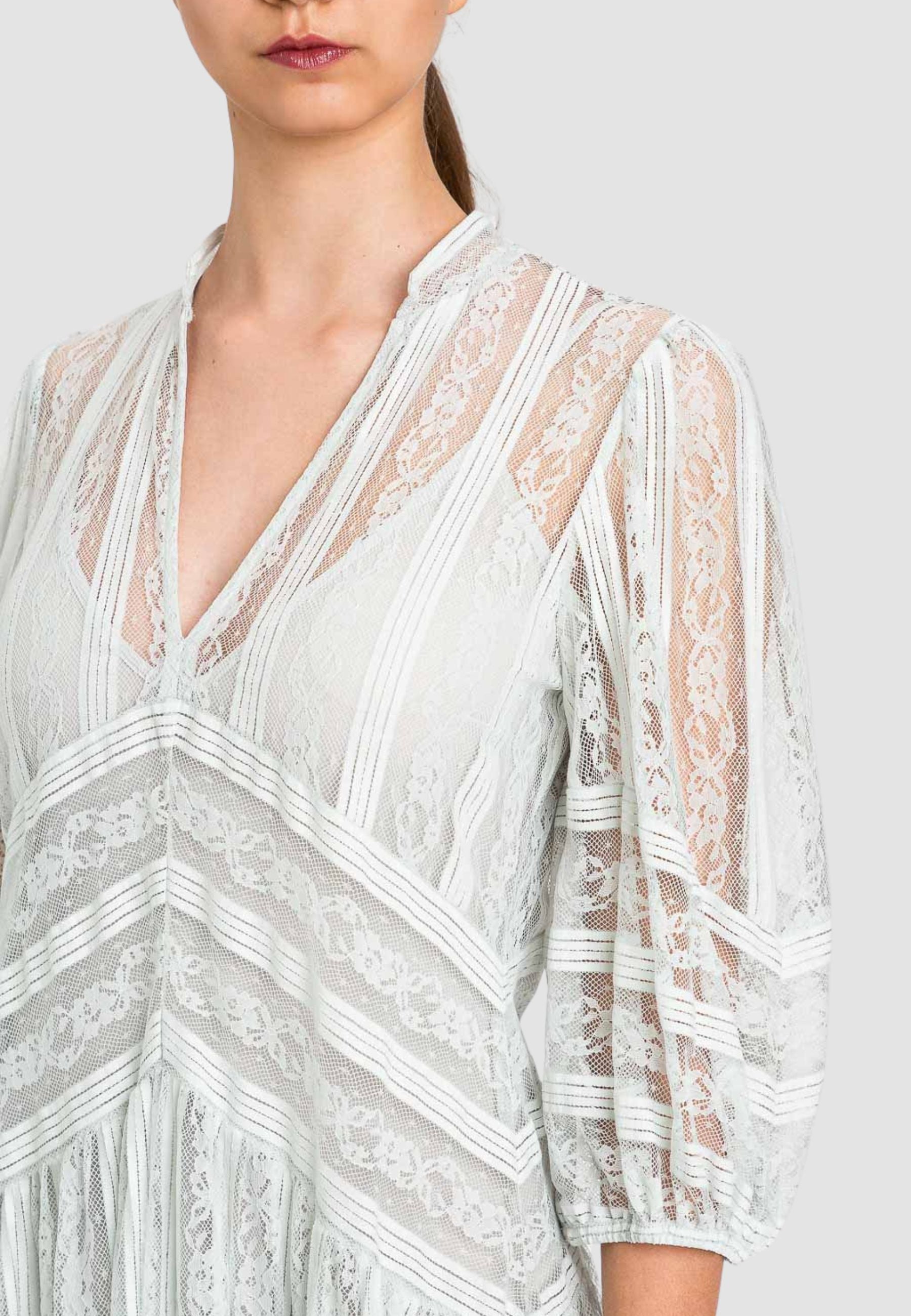 Abito corto in pizzo a righe 