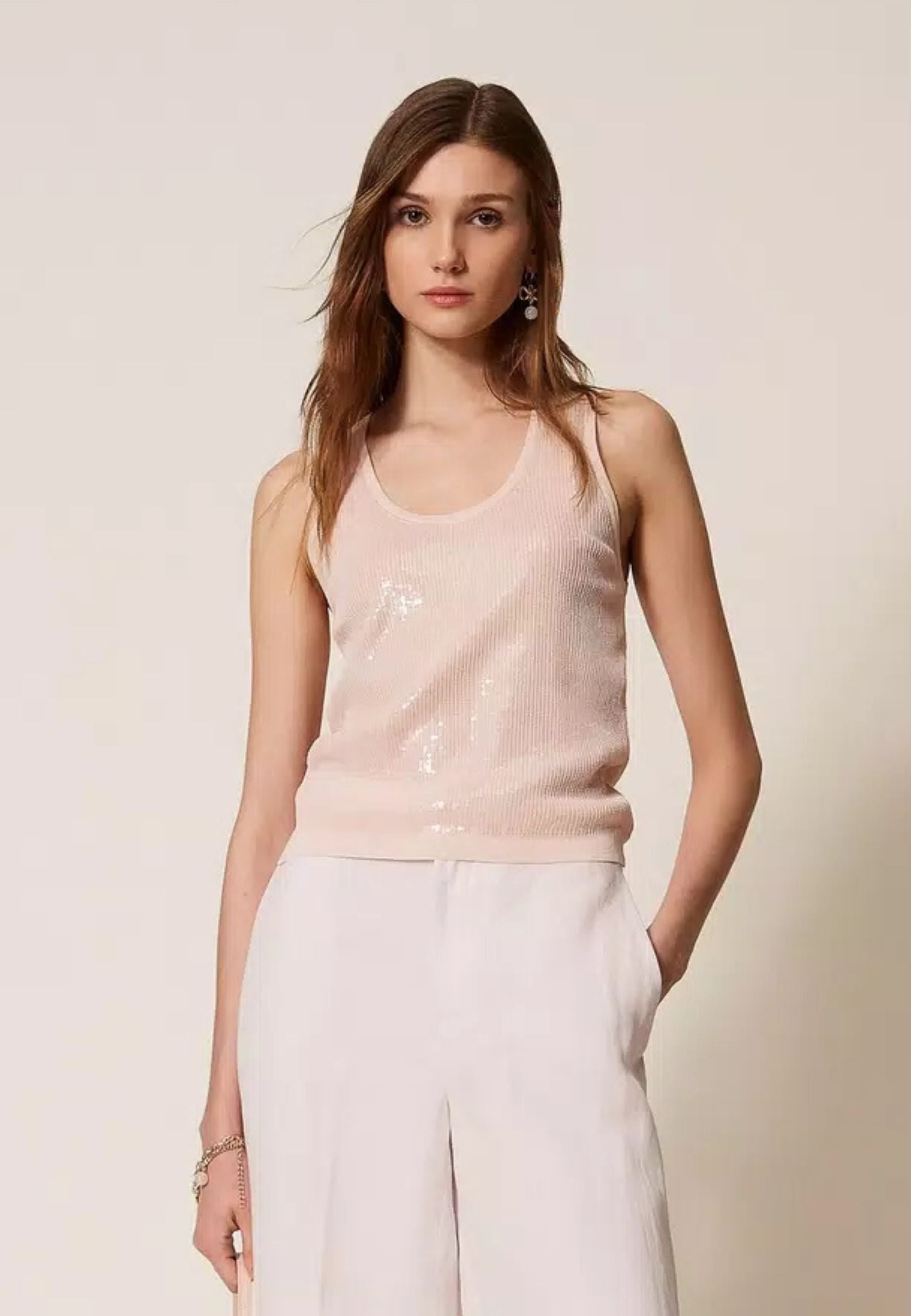 Top in maglia con paillettes 