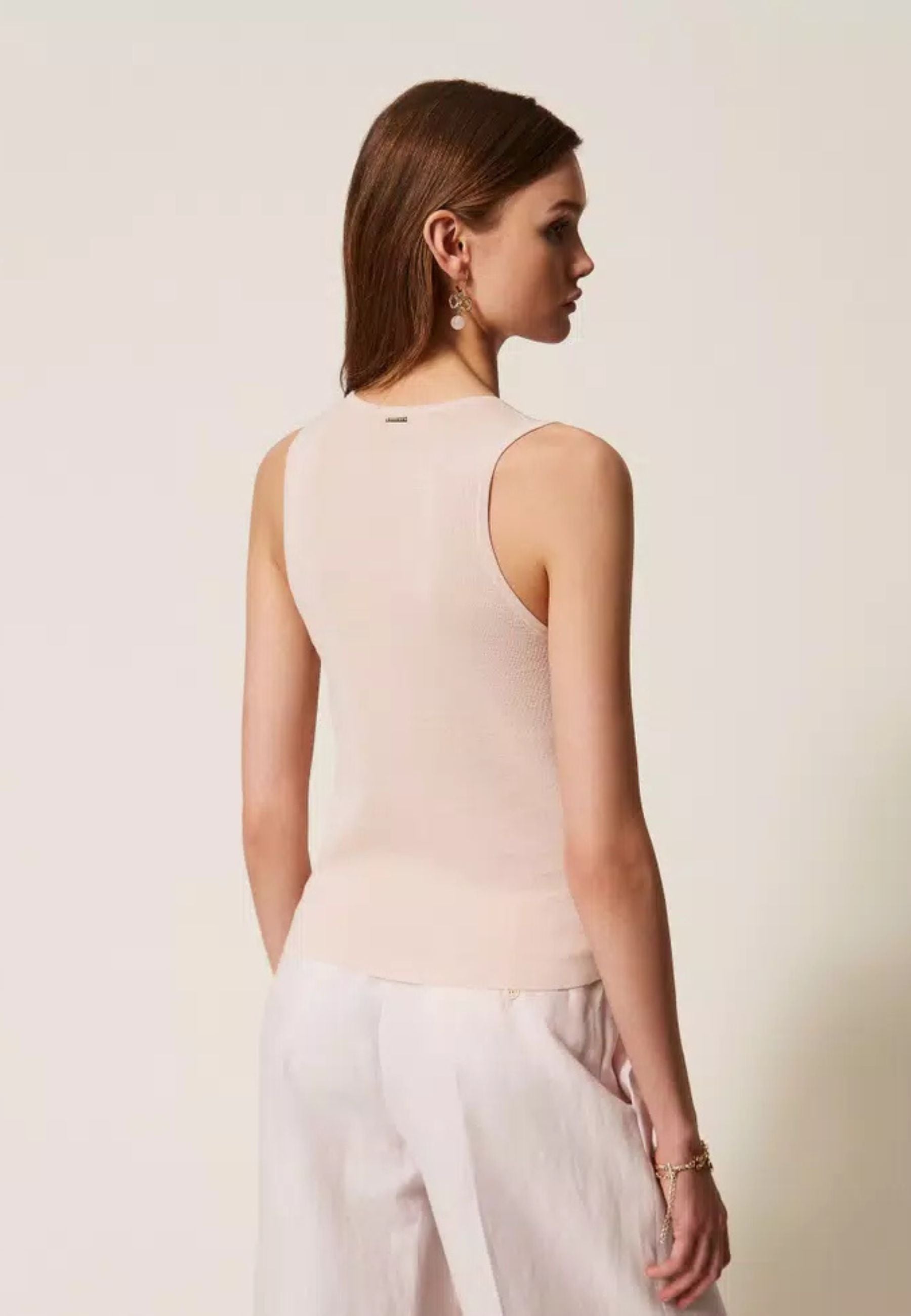 Top in maglia con paillettes 