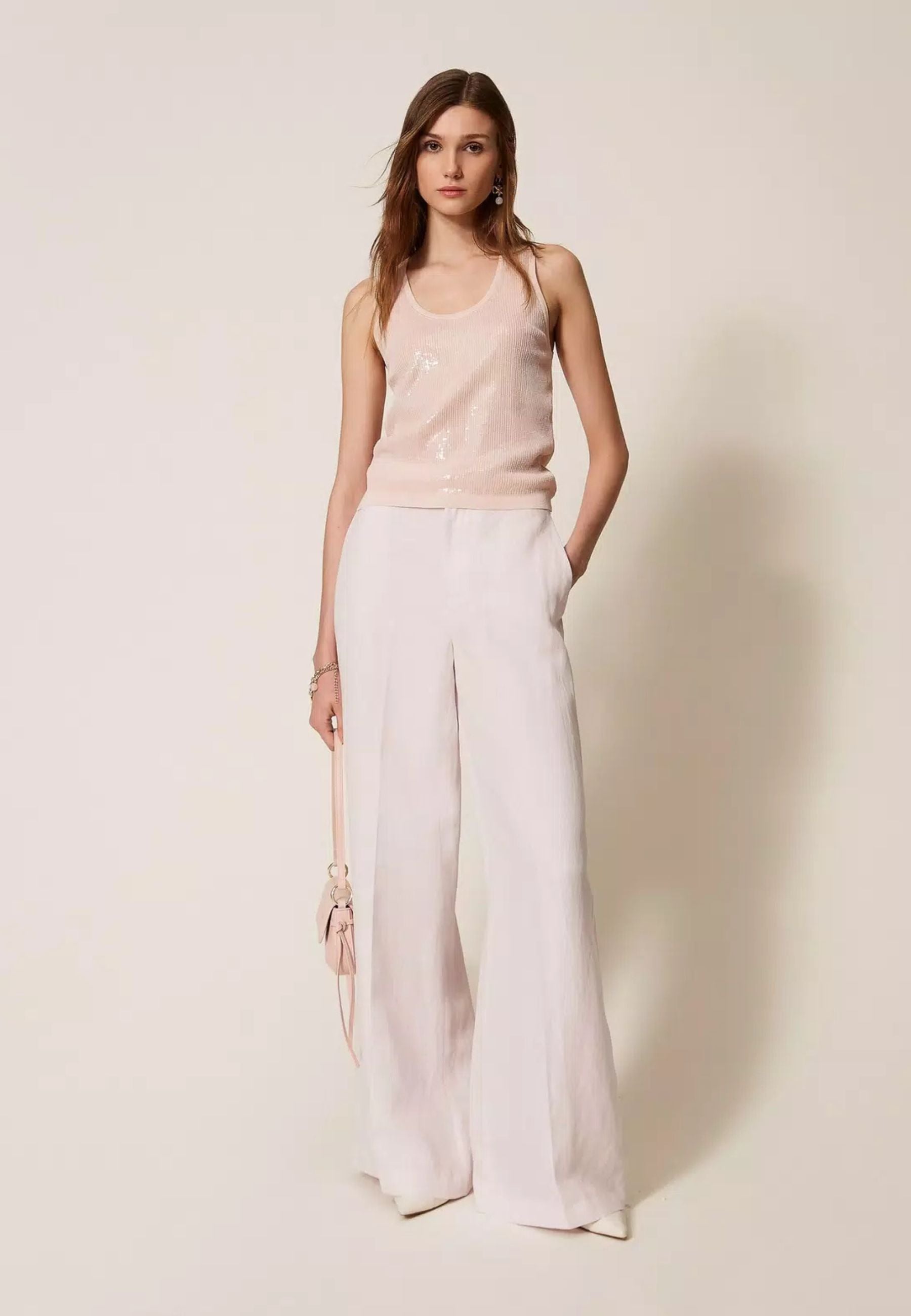 Top in maglia con paillettes 