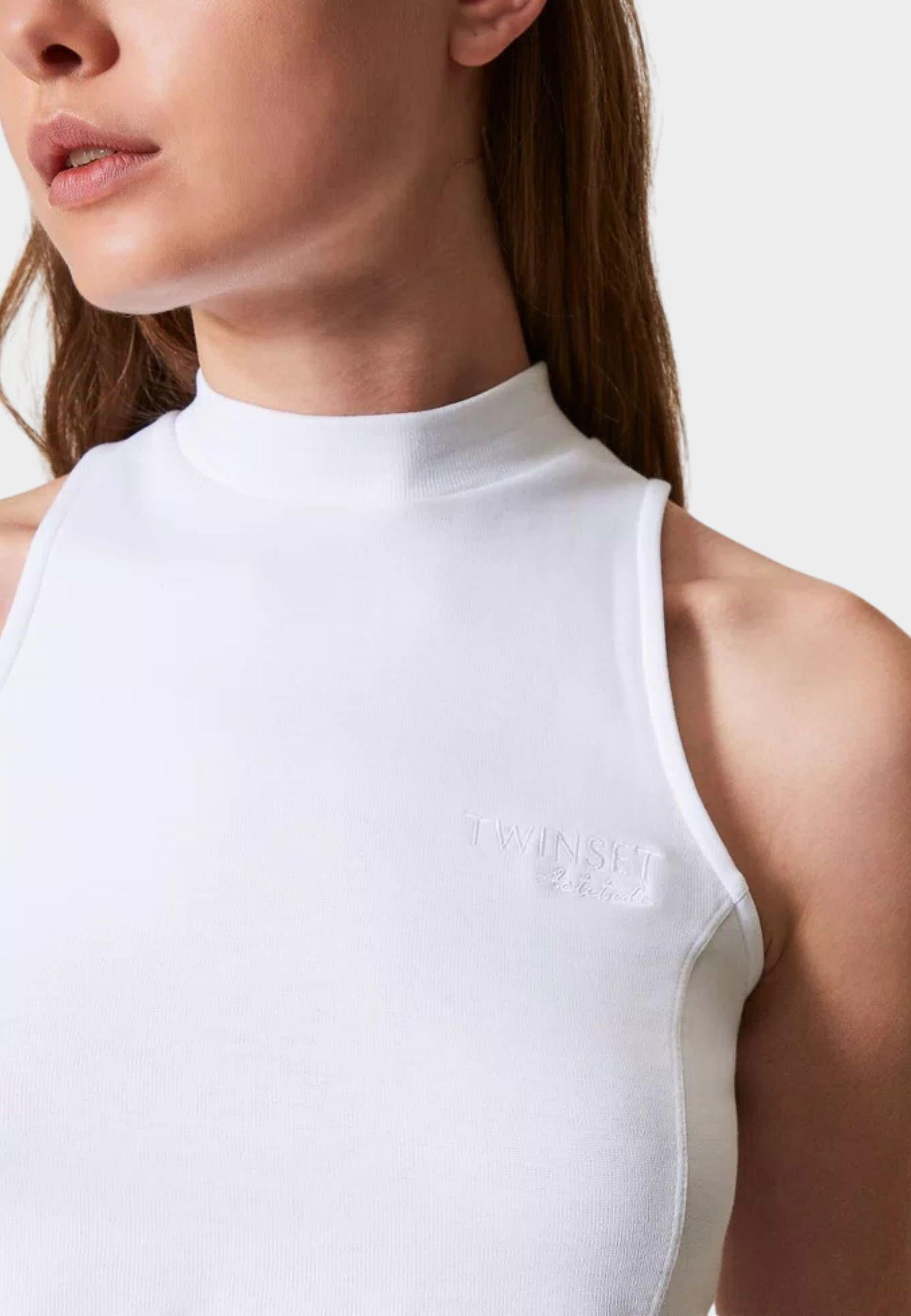 Top smanicato con collo alto in cotone interlock 