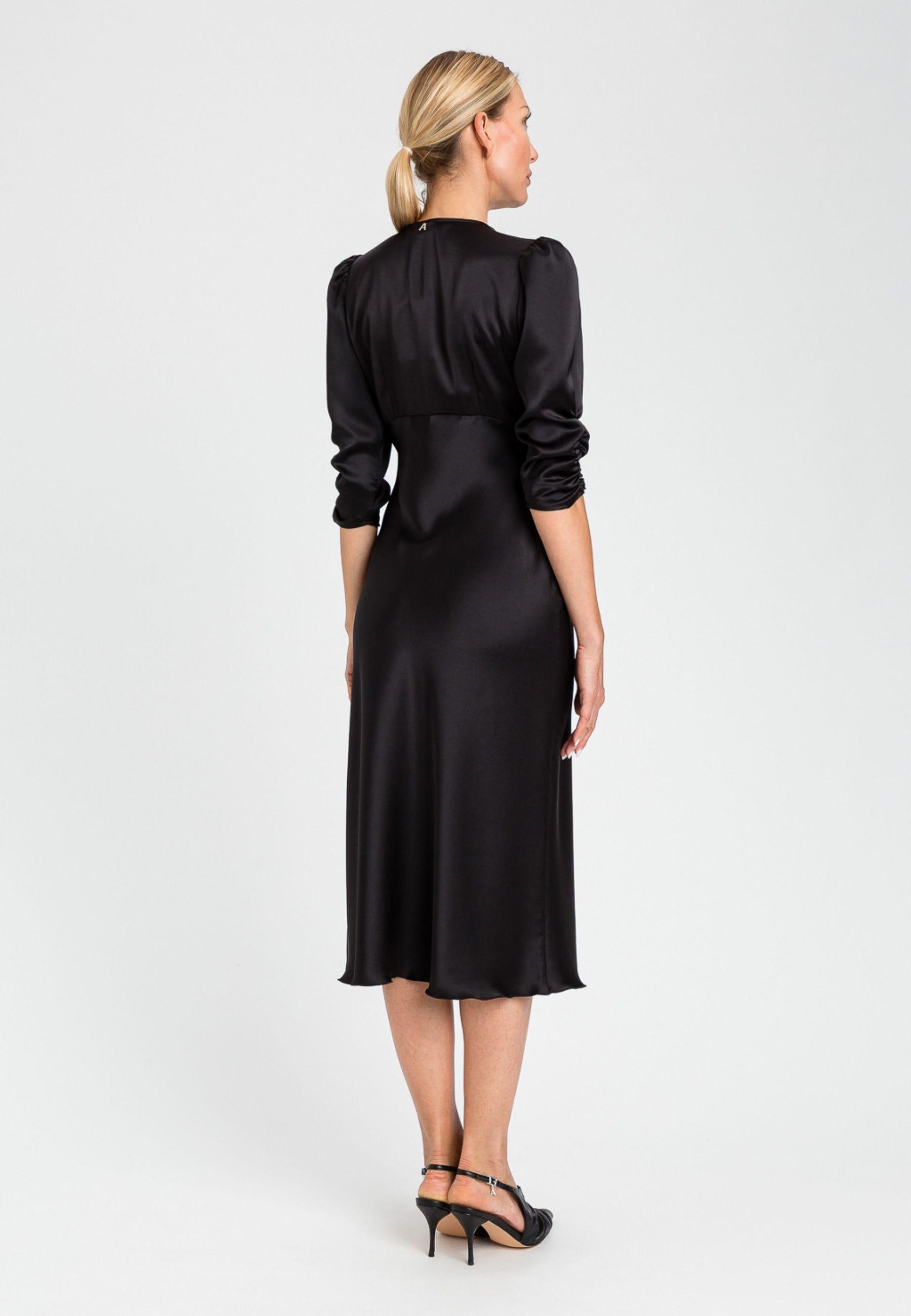 Abito midi nero effetto satinato - eleganza essenziale e femminilità contemporanea 