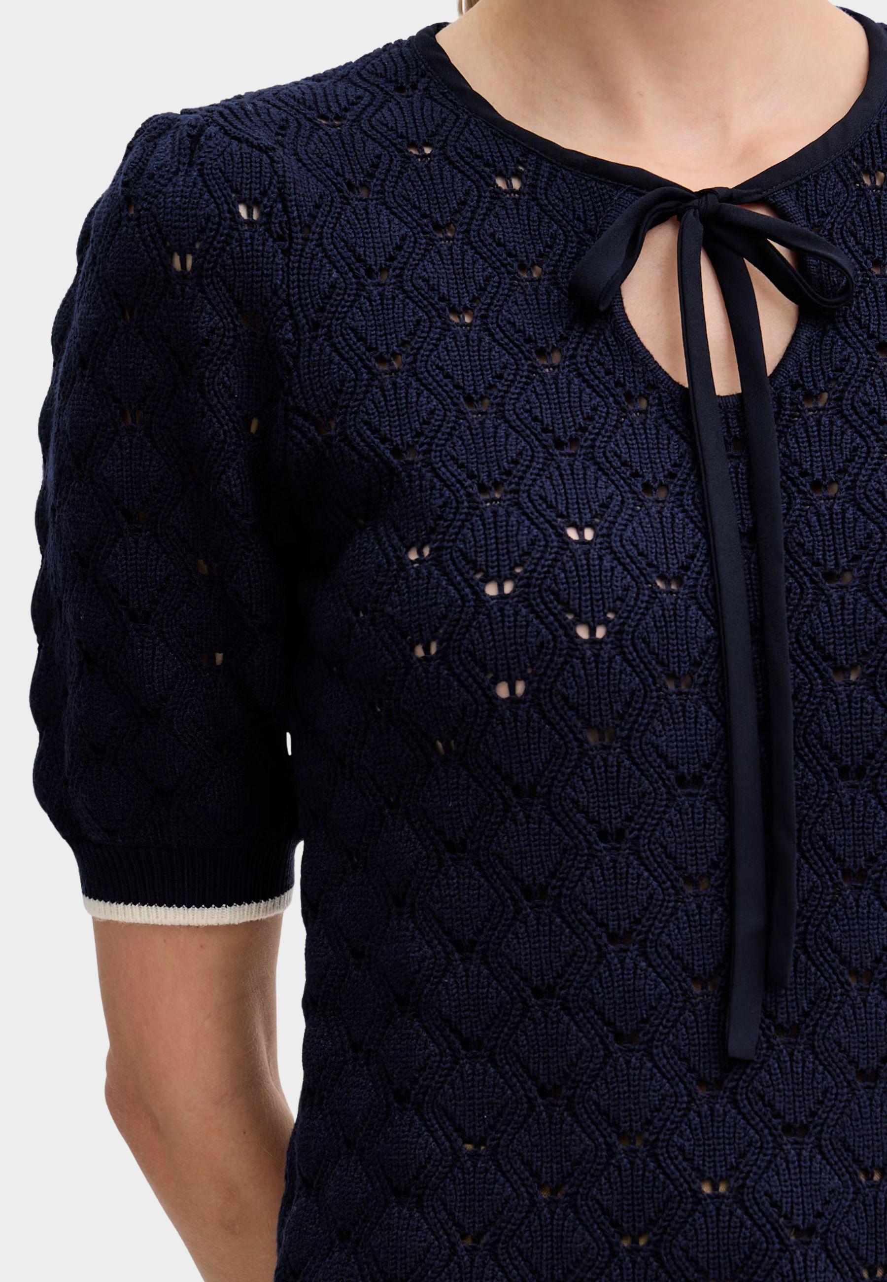 Maglia Twinset traforata con fiocco al collo 