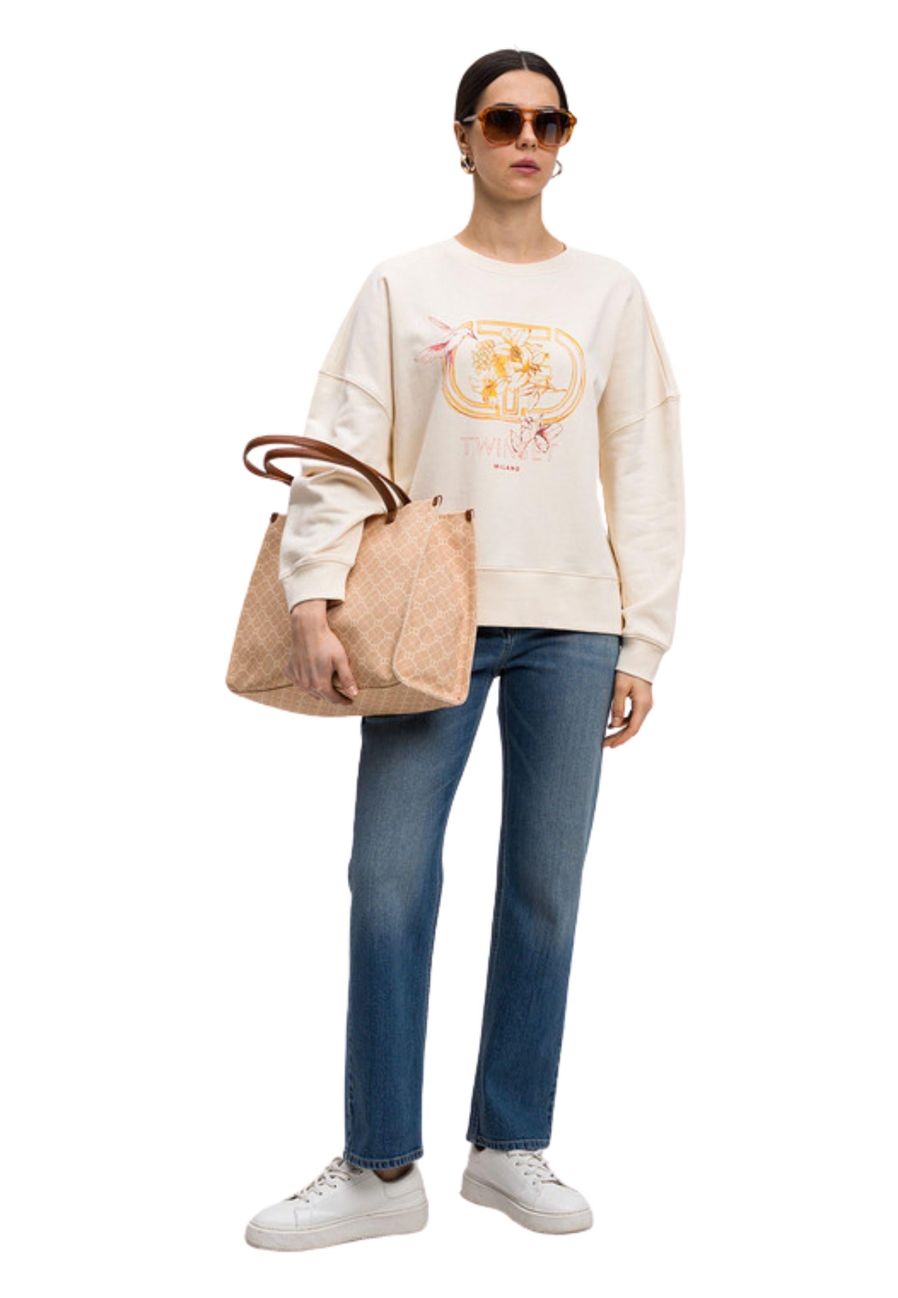 Jeans blu con ricamo del logo 