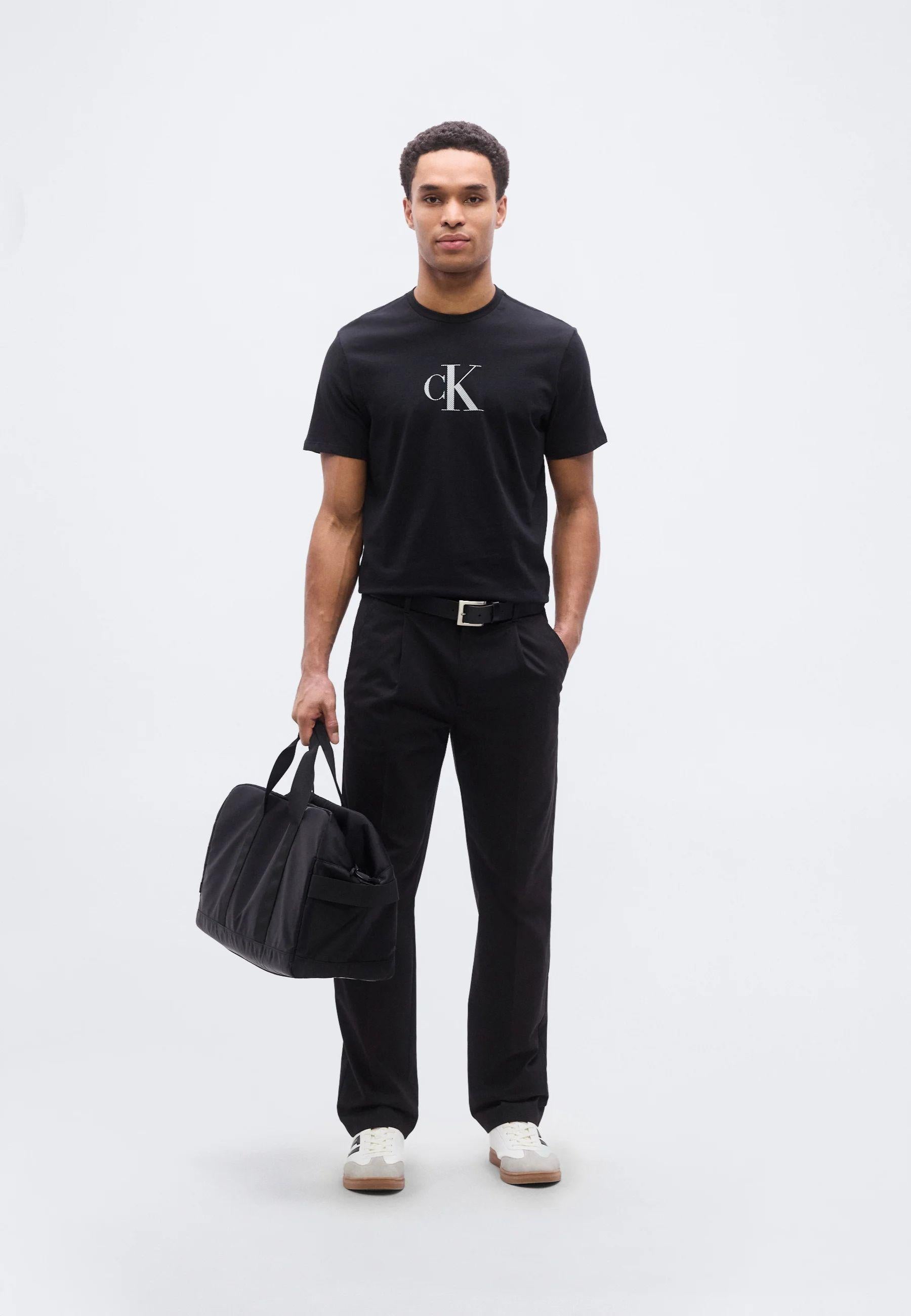 Calvin Klein - T-shirt logo CK in jersey di cotone 