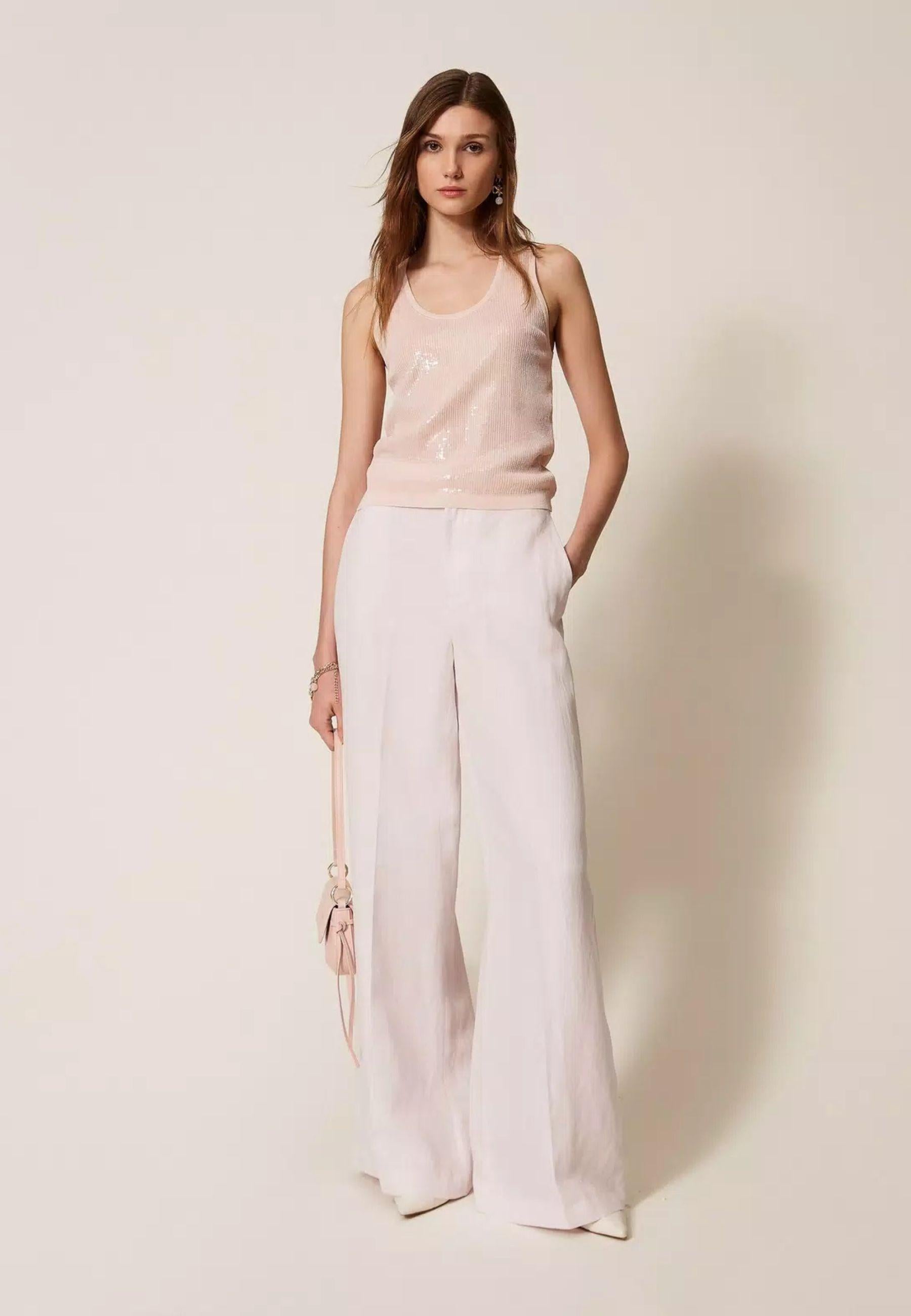 Top in maglia con paillettes 