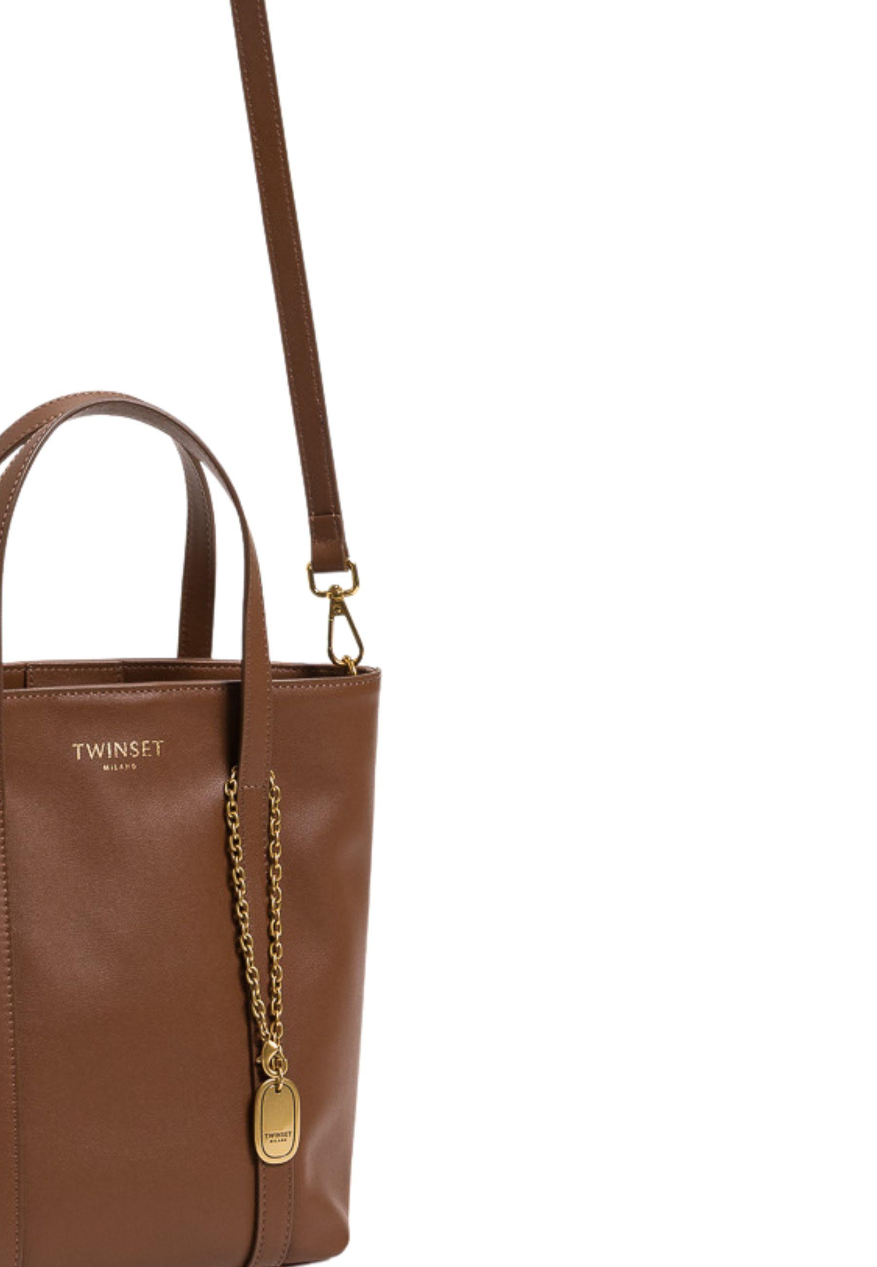 Borsa shopper in pelle con charm 