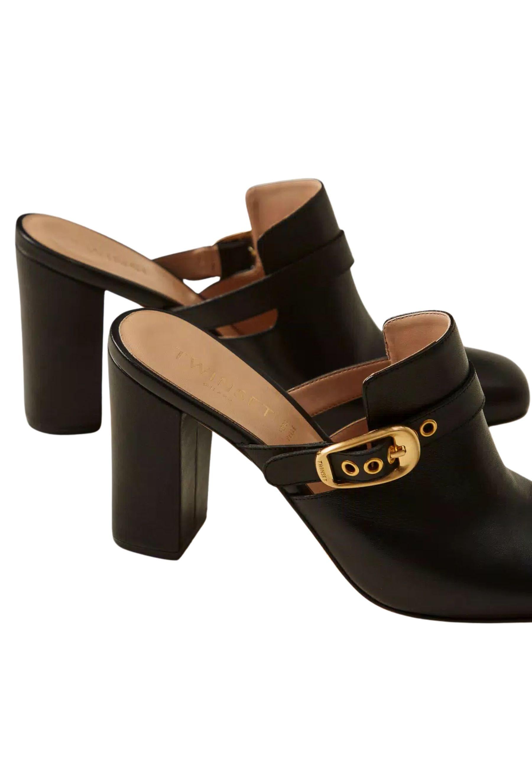 Scarpe mules in pelle con fibbia 